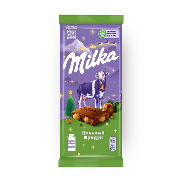 Шоколад молочный Milka с цельными лесными орехами