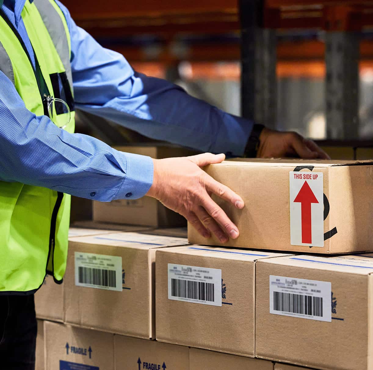Man folding the boxes