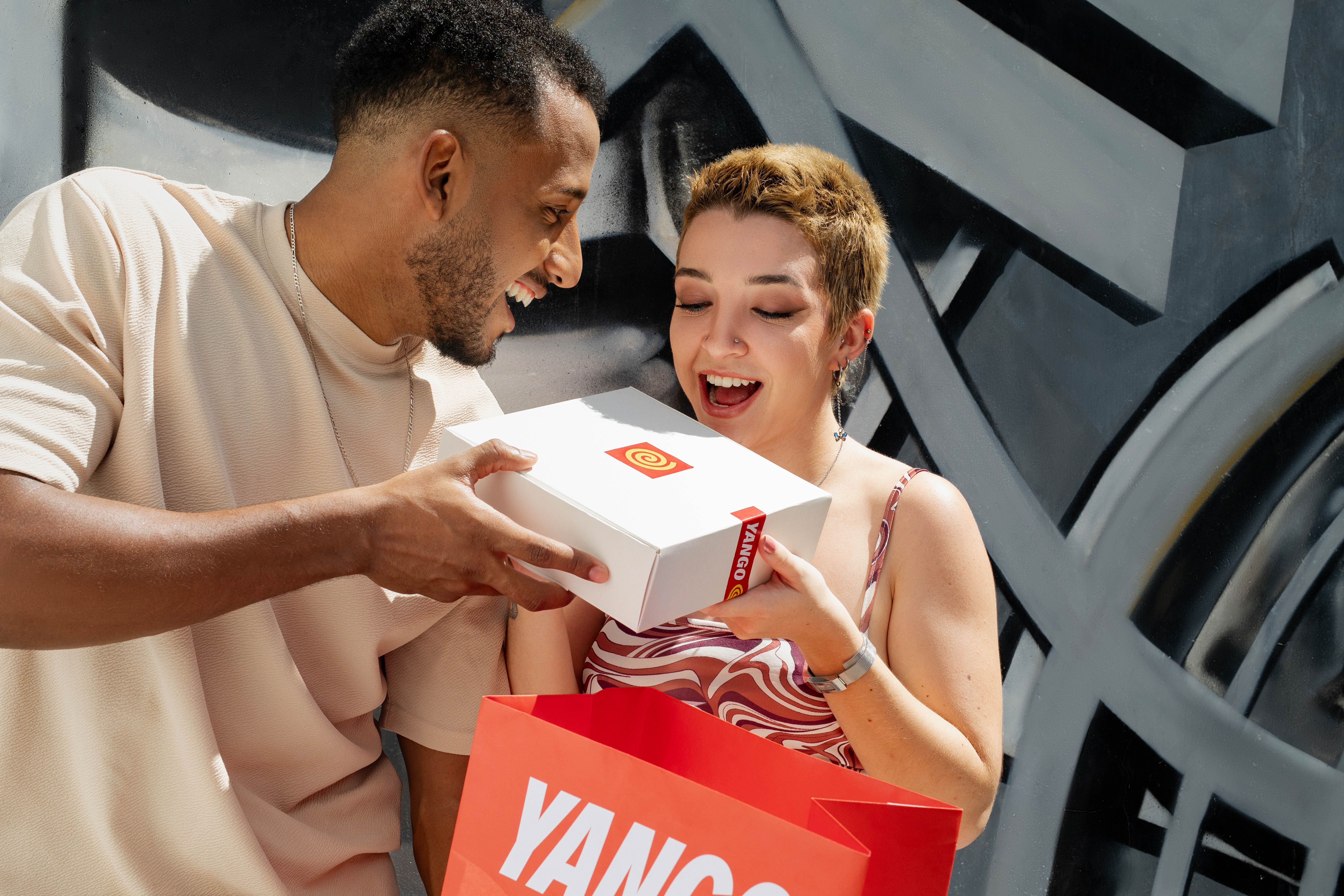 People receiving Yango Food delivery